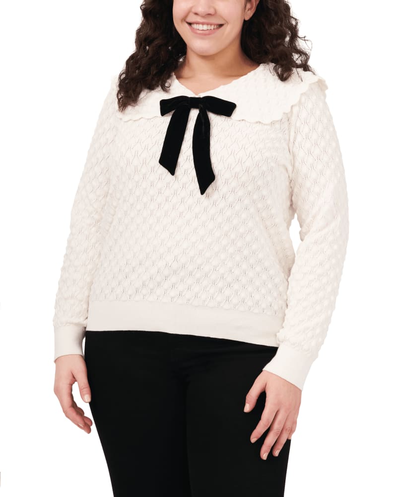 Front of a model wearing a size 1X Audriana Collared Bow Top Sweater in ANTIQUE WHT by CeCe. | dia_product_style_image_id:263514